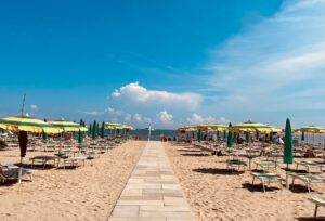 a beach with umbrellas